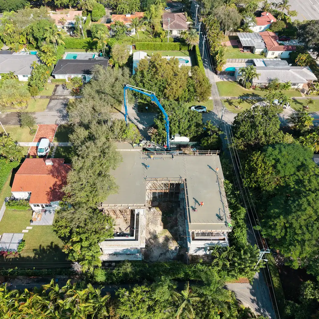 Drone view from above of the second-floor slab pour at the Kaēlo Residence, Miami Shores