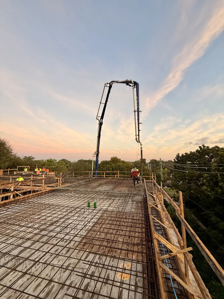 Second-floor slab reinforcing ready for the pour at sunset, Kaēlo Residence, Miami Shores